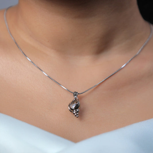 Conch cage pendant